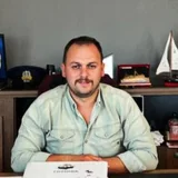 Aydınlı Mahalle Muhtarı Ozan Paşa Şen, muhtarlık makamında